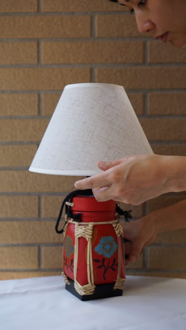 Handcrafted Red Bamboo Lamp with Blue Floral Design